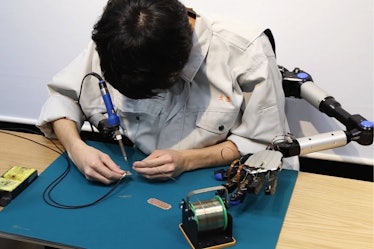 man metalimbs robot arms robotic limb circuit soldering iron solder