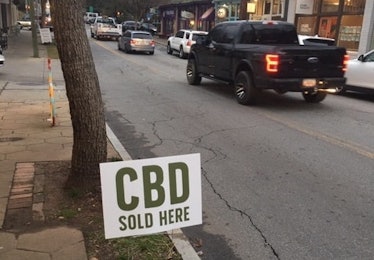 A sign outside a market in Atlanta on Jan. 18, 2019 advertising the availability of CBD.