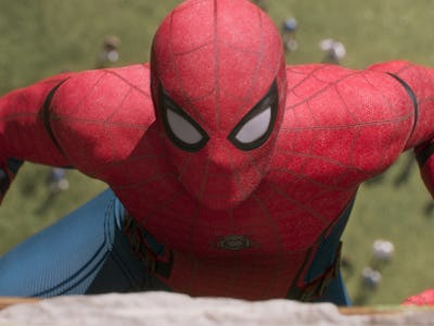 Aerial view of Spiderman climbing a wall