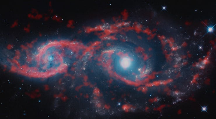 NASA's image of two galaxies colliding and forming a bizarre Galactic Eye