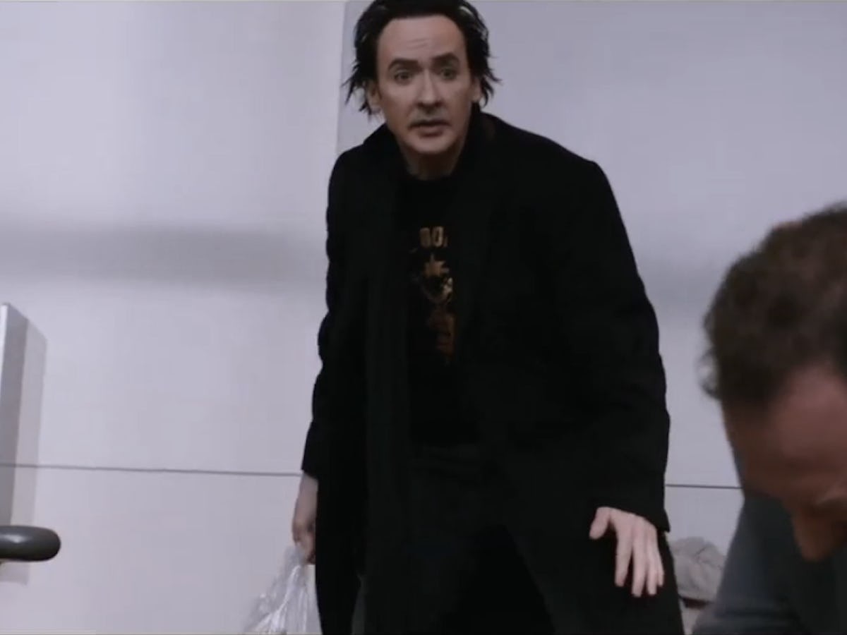 Watch John Cusack Barely React to Absolute Carnage in Stephen King's 'Cell' Film