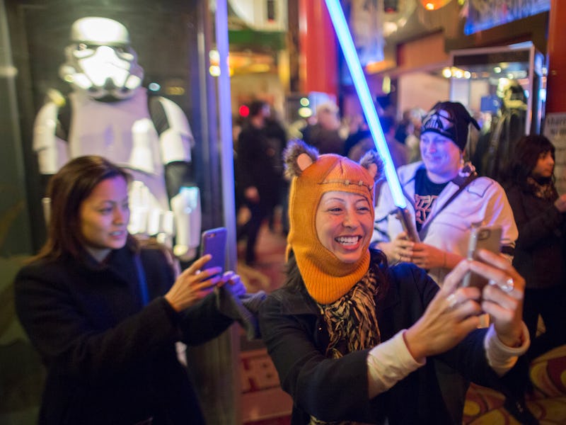 Moviegoers gathered to watch the sequel of 'Star Wars' titled 'The Force Awakens'.