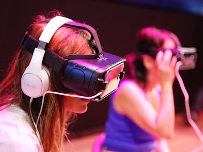 Two women using vr headsets