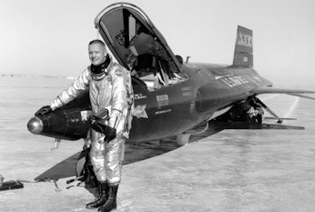 Armstrong and an X-15-1 rocket-plane after a research flight in 1960