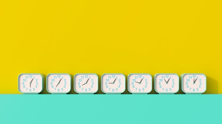 Seven alarm clocks next to each other