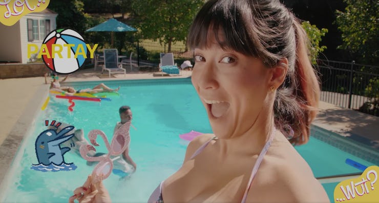 A woman taking a selfie with a swimming pool in the background for the Facebook Messenger Snapchat-l...