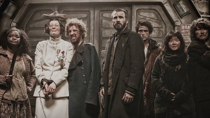 The cast from the 'Snowpiercer' TV show standing together in a scene from the show