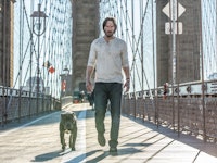 A screenshot with Keanu Reeves and a dog walking in John Wick: Chapter 3