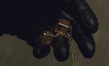 Kylo Ren holding the dice in 'The Last Jedi'