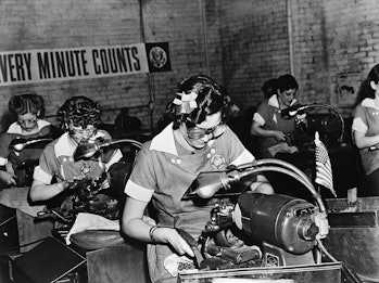 Women working in a factory during World War 2, when the U.S economy became totally focused on winnin...