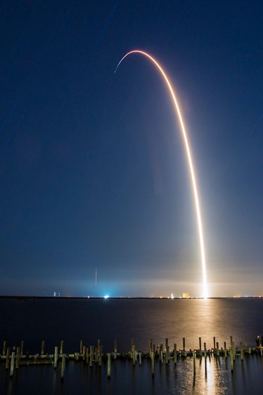 SpaceX's Merah Putih rocket taking off.