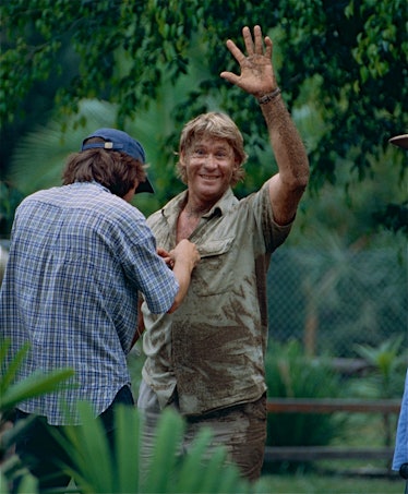 The Late " Crocodile Hunter " Steve Irwin after playing with Dingos