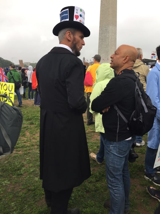 A man dressed as Abraham Lincoln at the March of Science