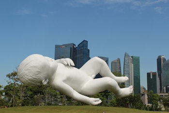Marc Quinn's giant baby sculpture (called Planet) in Singapore-s Gardens by the Bay.