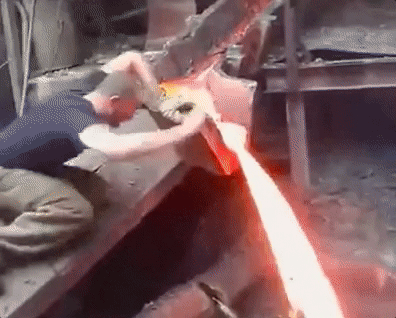 the-leidenfrost-effect-allows-this-man-to-pass-his-hand-through-molten-metal----but-only-briefly.gif