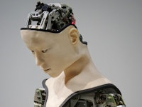 A humanoid robot with its mechanical components visible.