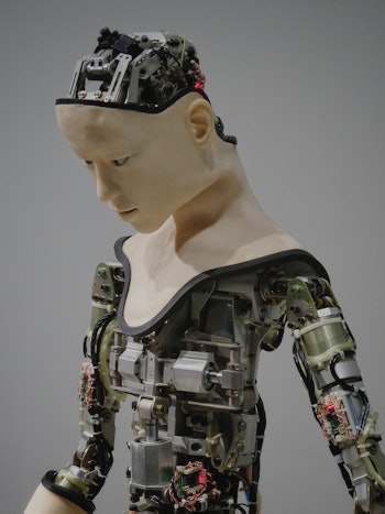 A humanoid robot with its mechanical components visible.