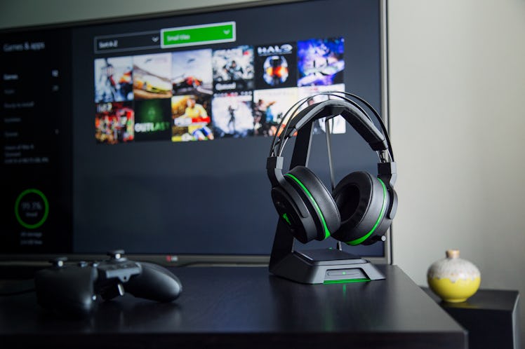 Razer Thresher Ultimate gaming headset next to a TV