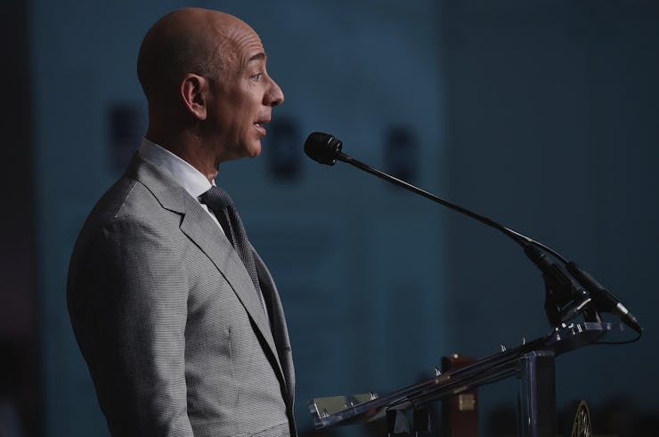 Jeff Bezos in a grey suit during a speech