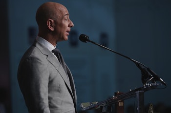Jeff Bezos in a grey suit during a speech