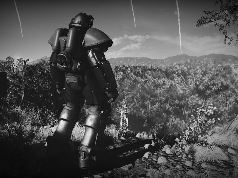 A screenshot from fallout 76 with a man in power armour looking over the wasteland