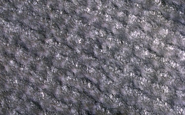 A closer look at the texture of the ground surrounding the Martian sand dunes.