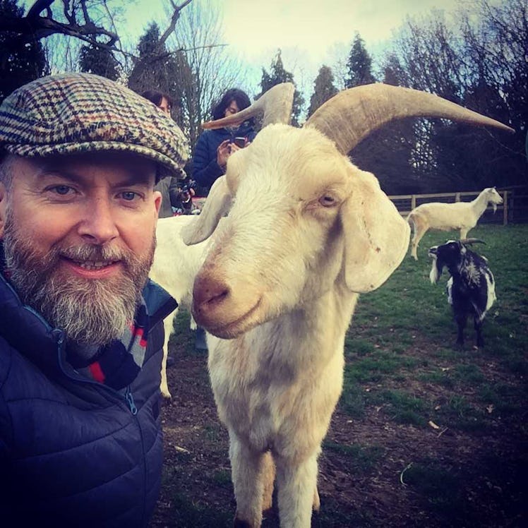 Alan Mcelligott (left) and a goat (right).