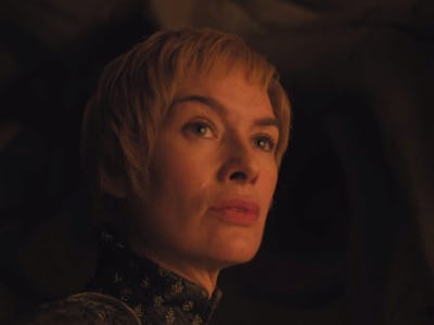 A closeup of Cersei in Game of Thrones looking into the distance 