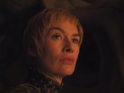 A closeup of Cersei in Game of Thrones looking into the distance