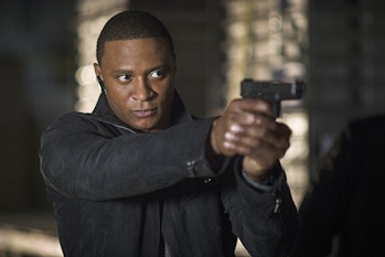 Diggle holds a gun on 'Arrow'