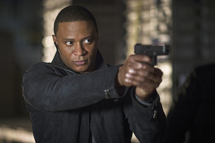 Diggle holds a gun on 'Arrow'