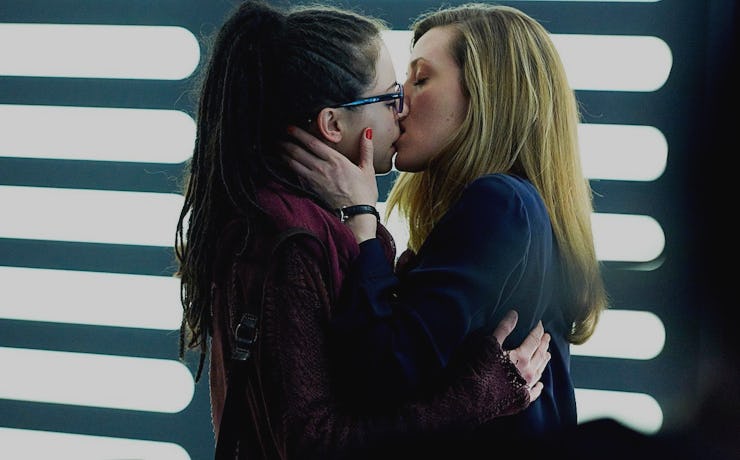 Evelyne Brochu and Tatiana Maslany kissing in a scene in Orphan Black