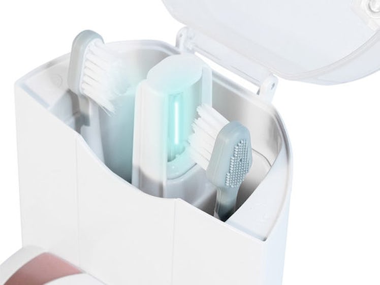 Platinum Sonic Toothbrush & UV Sanitizing Charging Base With 2 Bonus Brush Heads (Rose Gold)