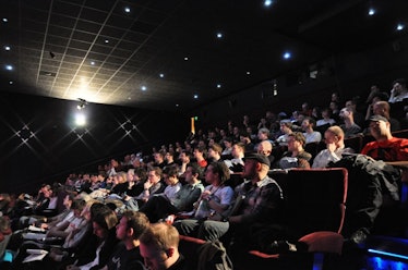 Close-up picture of the audience sitting and watching the masterclass.