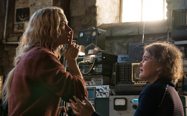 Evelyn Abbot (Emily Blunt) in 'A Quiet Place' next to her daughter Regan (Millicent Simmonds).