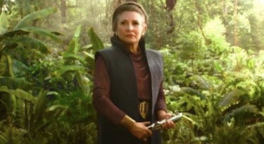 Leia holds the famous Skywalker family lightsaber in 'Star Wars: The Rise of Skywalker'