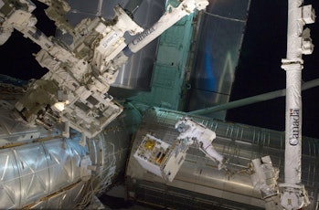Astronauts at the International Space Station working on rocket refueling experiments.
