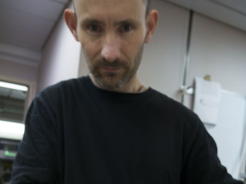 A man holding the deepest-living predator that has evolved ingenious strategy for having sex