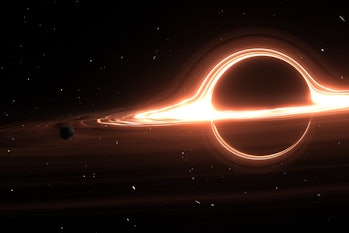 A black hole's accretion disk swirls around it, emitting x-rays.