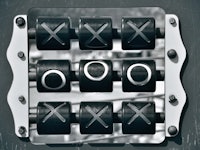 A metal square-shaped Tic-Tac-Toe box game.