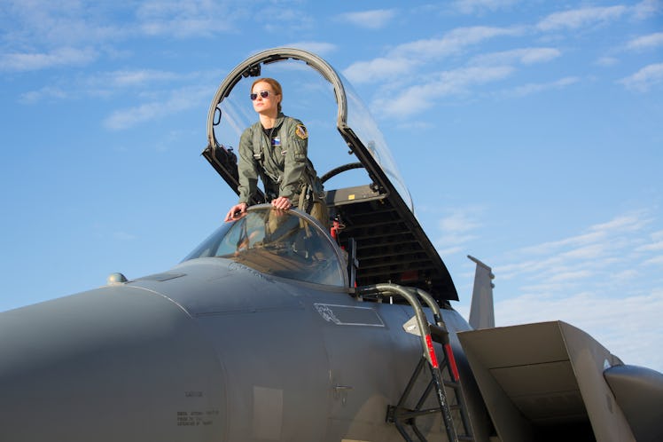 Brie Larson as Captain Marvel in the movie coming out of the jet.