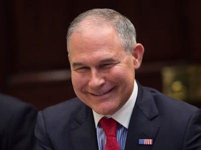 Scott Pruitt smiling in his blue suit