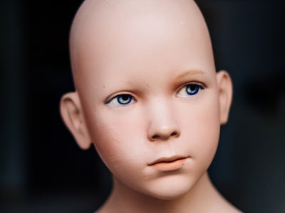 A digital 3D illustration of a young hairless child