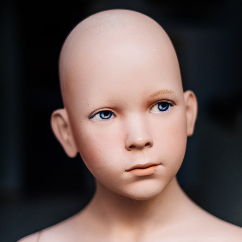 A digital 3D illustration of a young hairless child