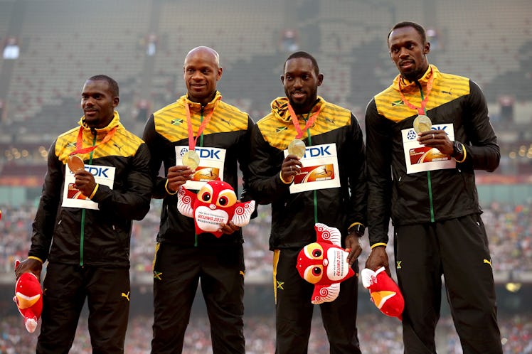 BEIJING, CHINA - AUGUST 30: Gold medalists Nickel Ashmeade of Jamaica, Asafa Powell of Jamaica, Usai...
