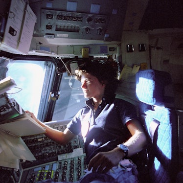 (June 1983) Astronaut Sally K. Ride, mission specialist on STS-7, monitors control panels from the p...