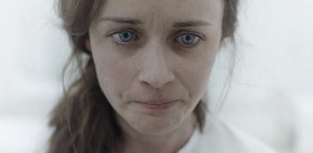 Ofglen (Alexis Bledel) is debriefed on what the government has done to her.