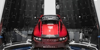 Elon Musk's Tesla Roadster inside a payload fairing in a photo shared in December 2017. The car will...
