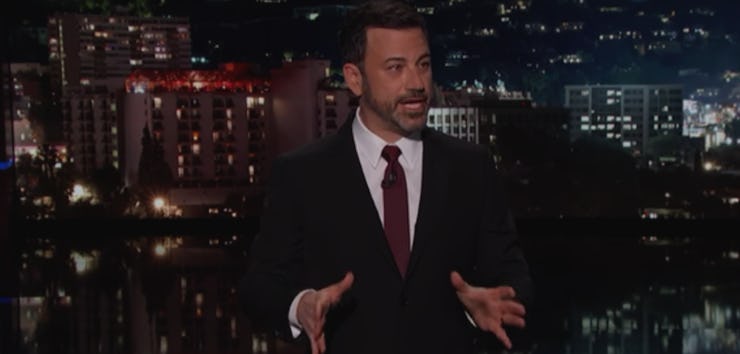 Jimmy Kimmel in a black suit and white shirt being emotional while he shares the story of his newbor...