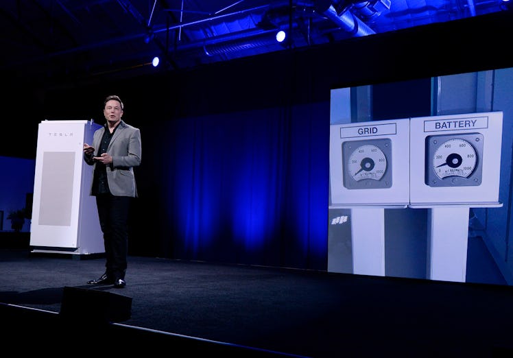 Elon Musk presenting his company's home-storage batteries.